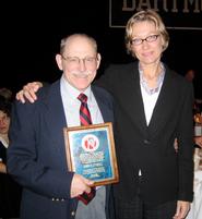 John O'Neill receives plaque from Anna Battigelli, 2007 NEASECS president.