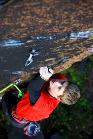 James Otey '11 on his rock climb in Little Falls.