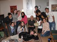 New York Program students present Randy Cohen with a homemade cake.