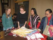 Kate Hails '10, Kenyon Laing '09, Ma Cho and Mu Sa Lee at the Refugee Center.