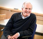 Scott Hand '64 talks with students in the Red Pit.