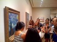 Students in Brent Plate's Religion and Modern Art seminar view Van Gogh's <em>Starry Night</em>.