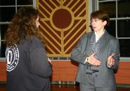 Lt. Col. Margaret Stock, right, talks with a student after her lecture.