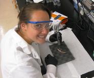 Theresa Allinger '11 examines a 450-year-old deep water coral specimen.