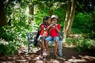 Hannah, 7, and Naomi Gardner-Woods, 8, look at photos in Root Glen. They're the daughters of Ruth Gardner-Woods '99 of New Hampshire.