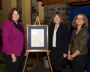 Volunteer of the year Melissa Joyce-Rosen '86 with president Joan Hinde Stewart and Alumni Association president Julie Ross '84