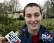 Emma Domby '11 speaks to a WLOX reporter