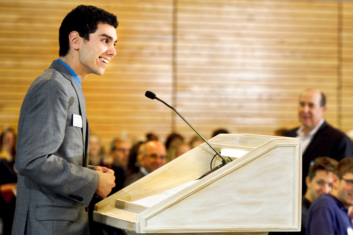 Michael Nelson '16 speaks to guests during the annual Comstock Luncheon.