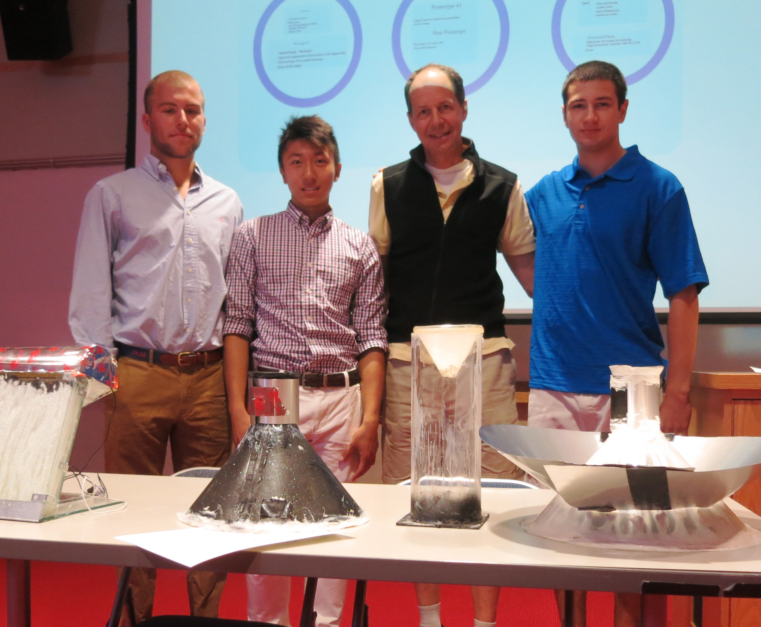 From left John McGuinnis, Andy Chen, Professor Todd Rayne and Zachary Pilson