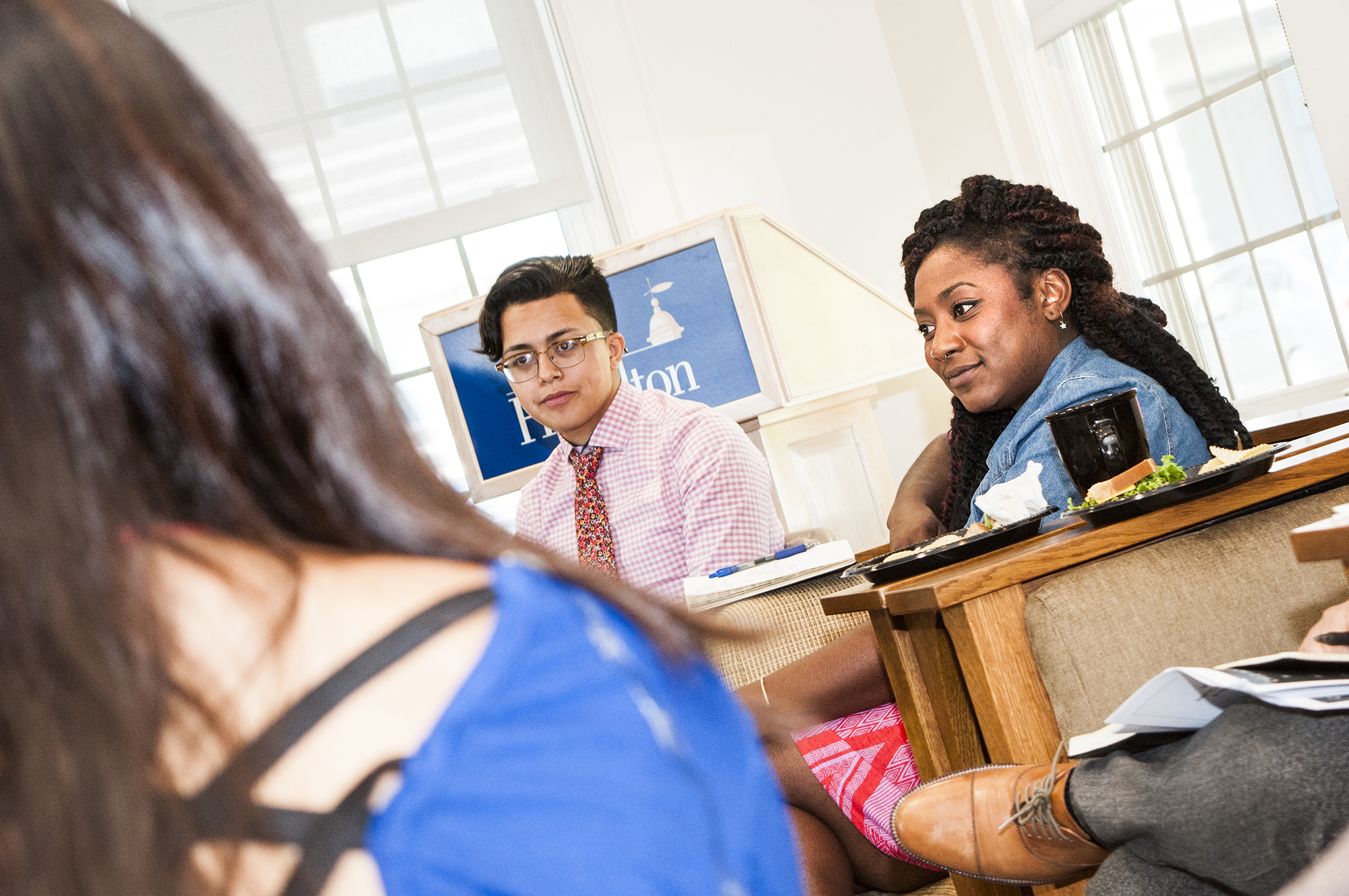 Alicia Garza, right, meets with students in the Days-Massolo Center.