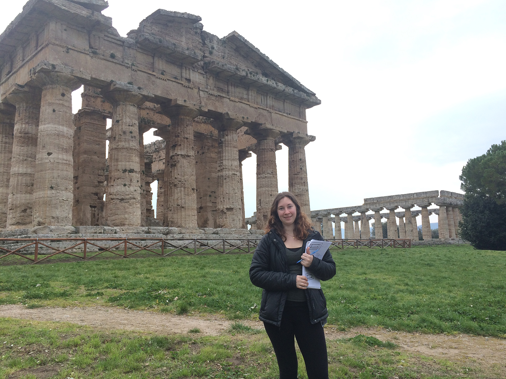  Rachel Beamish '16 poses in front of Greek temples while studying abroad in Rome.