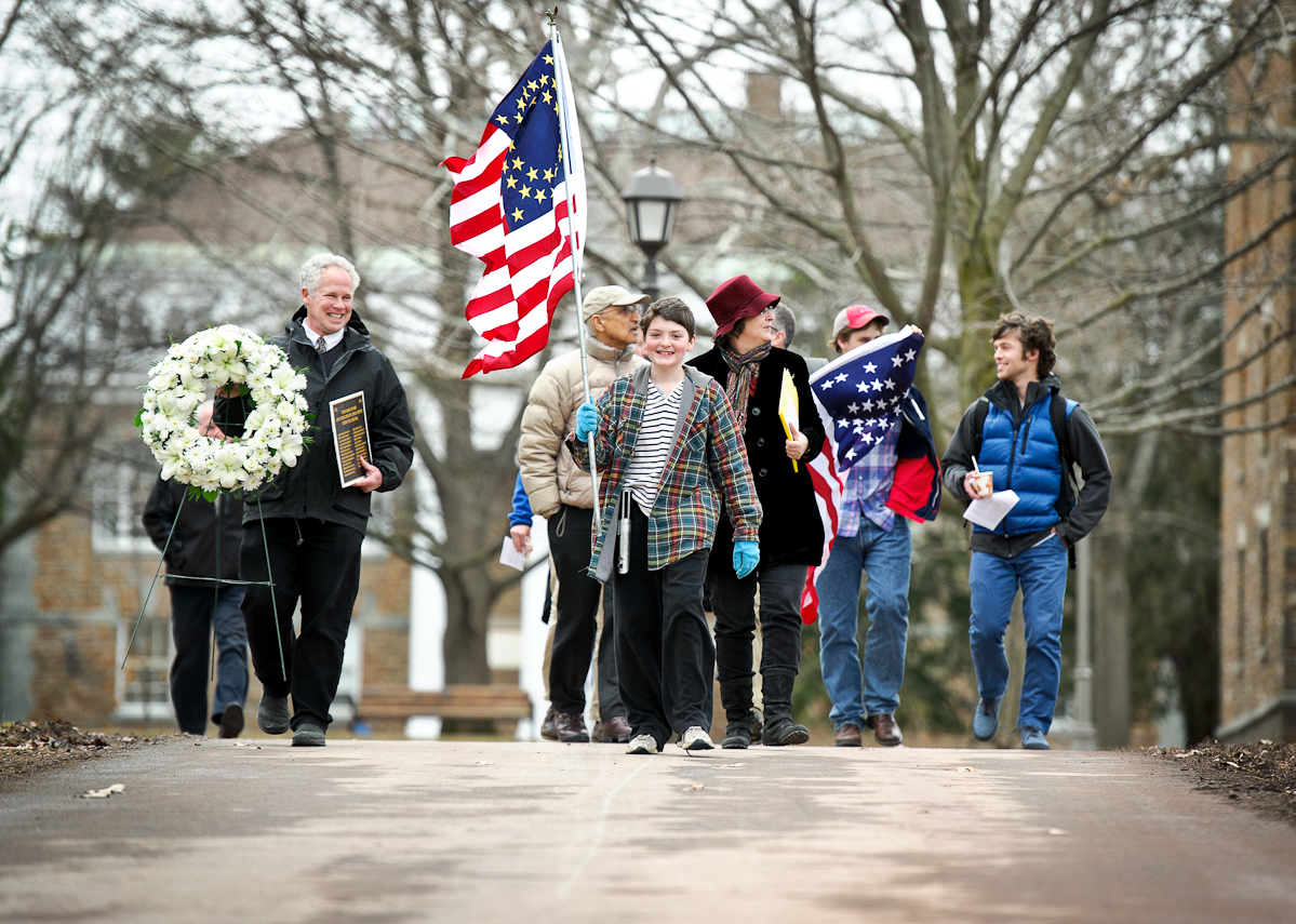 Hamilton community members process to the College cemetery to lay a wreath in honor of Hamilton's Civil War dead.