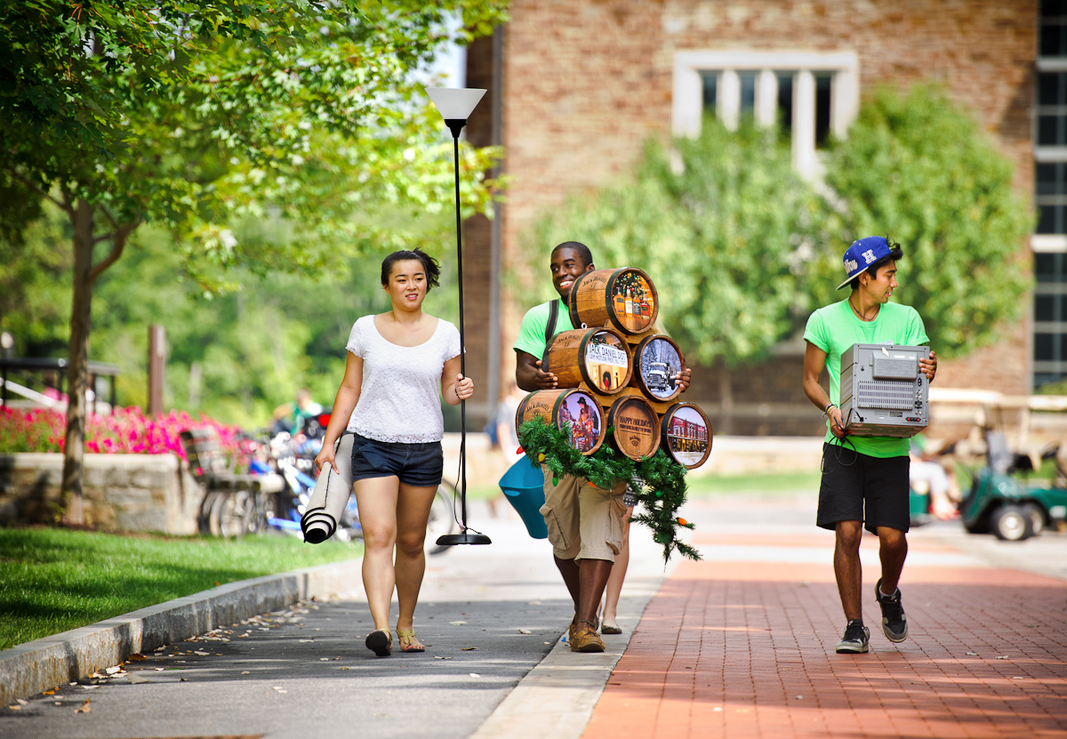 Hannah Tessler '14, Torian Pope '14 and Jaime Leiva '14 haul away their catch of the day during annual Cram & Scram.