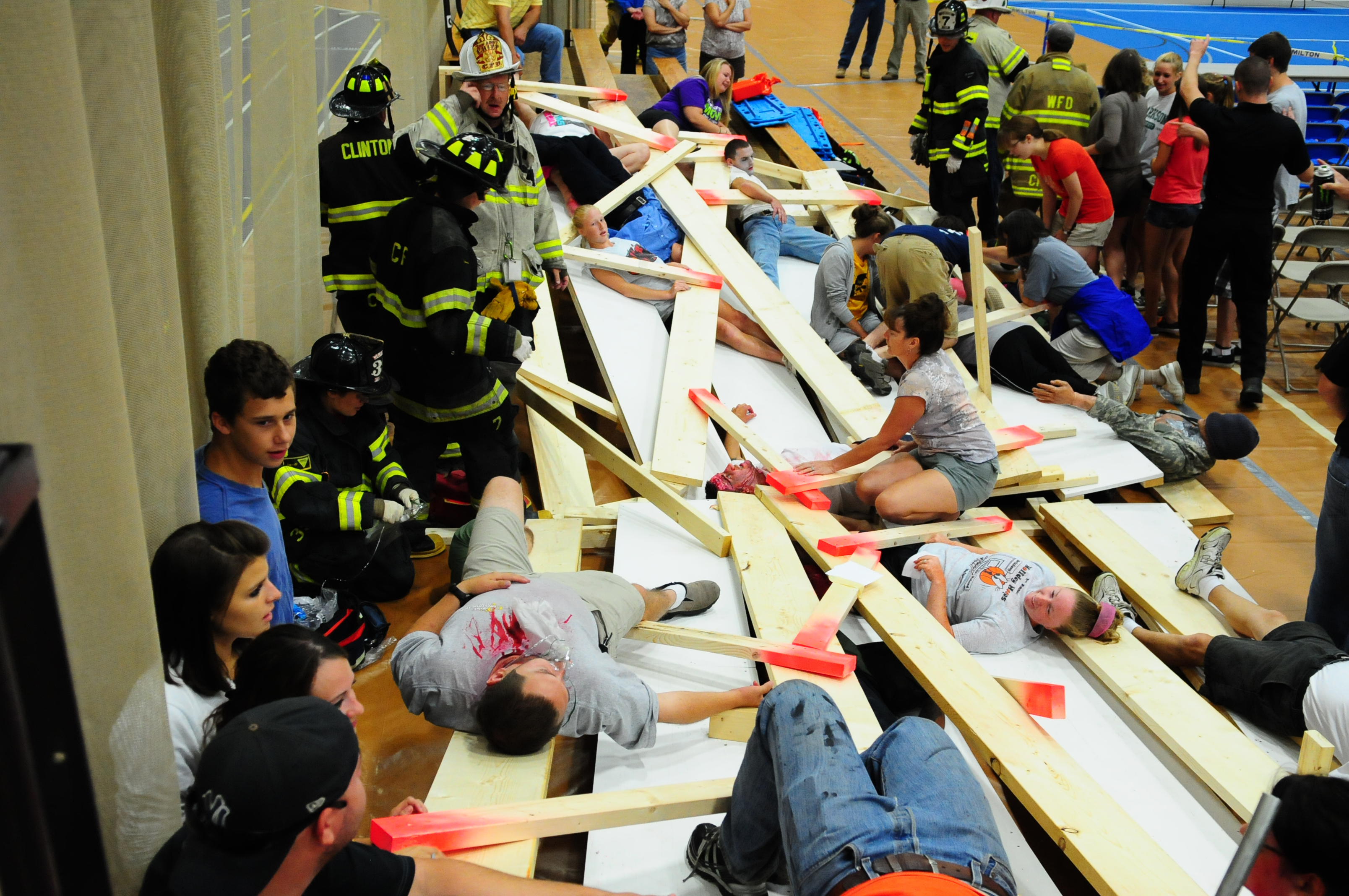 The staged bleacher collapse in the emergency drill.