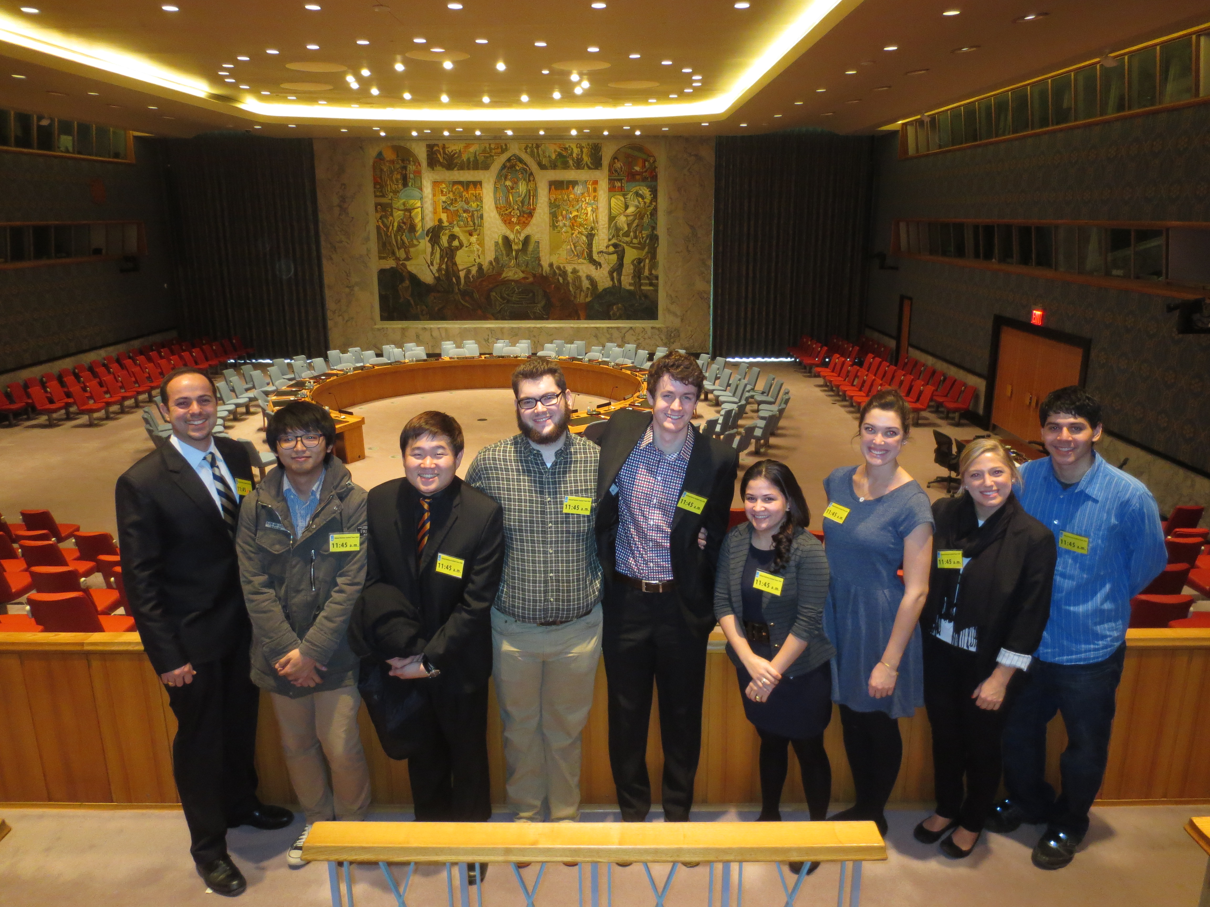 In the UN Security Council chamber Prof. Calin Trenkov-Wermuth, Won Seog Chung, Mathew Ha, Scott Hancox, Daniel O'Kelly, Marcela Peguero, Nell Goddard, Meg Alexander and Miguel Rosado.