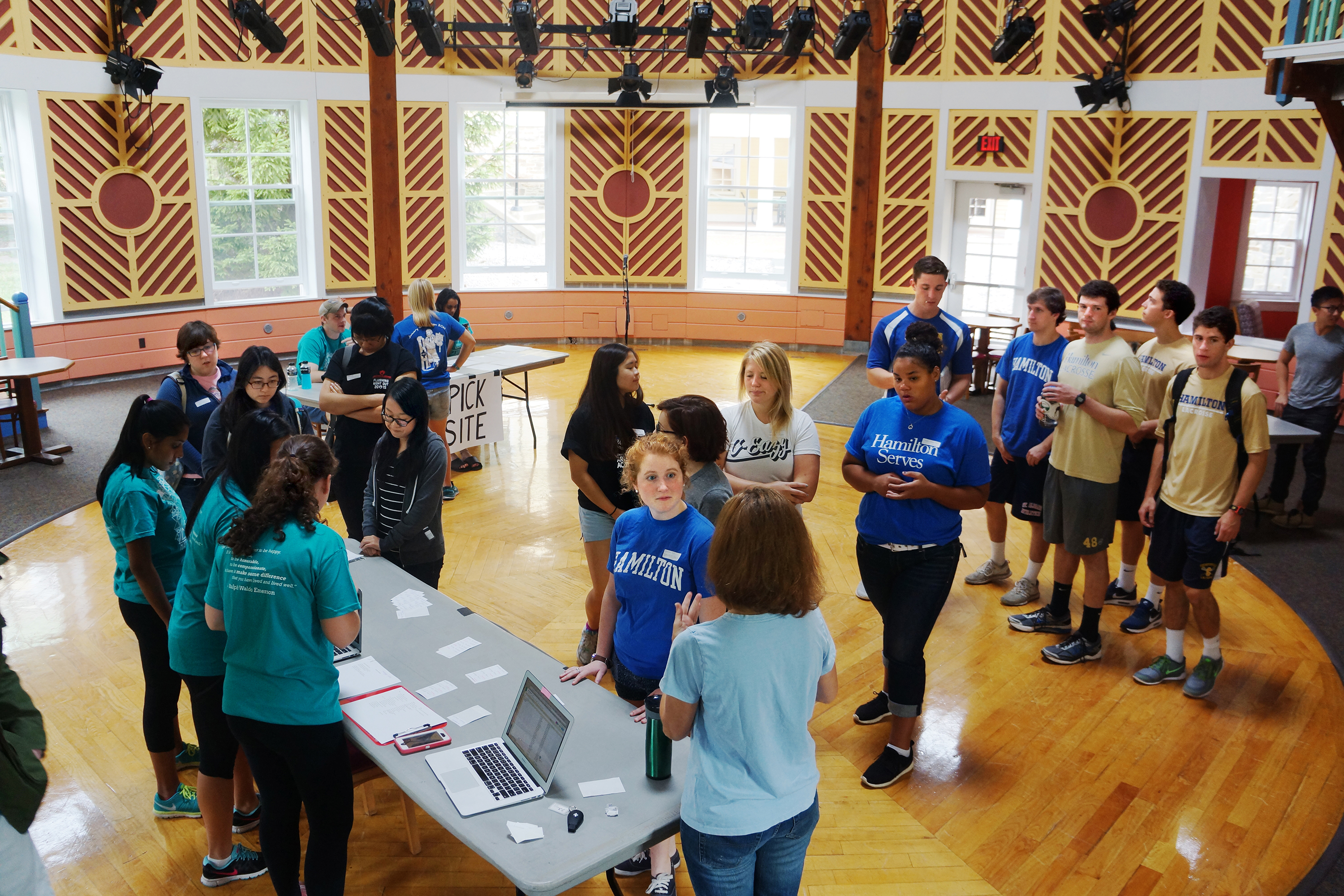 Students gather in the Events Barn to sign up for Make a Difference Day volunteer opportunities.