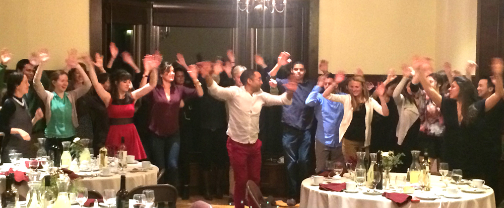 Dance instructor Roberto Luis Perez from Syracuse leads the Hispanic Studies majors in a dance.