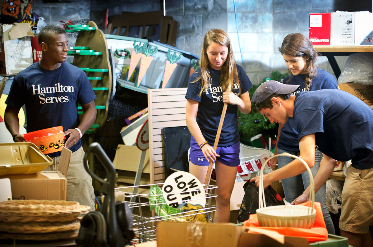 Marcus Gutierrez '18, Katja Dunlap '18, Mariaelena Hiller Chacin '18 and Aaron Channon engaged in community service in Utica.