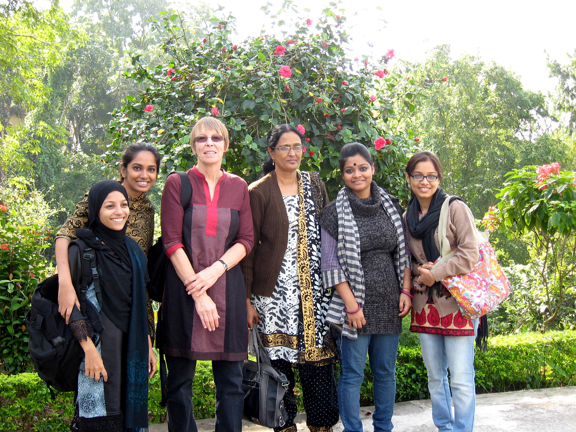 Jinnie Garrett and students from the Asian University for Women, where she is serving as dean of faculty.