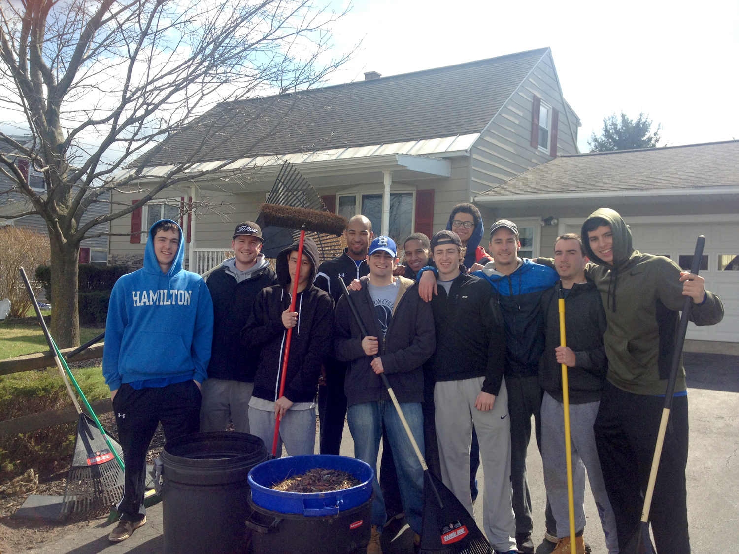 Members of the men's basketball team helped clean some senior citizens' yards in New York Mills on April 20.