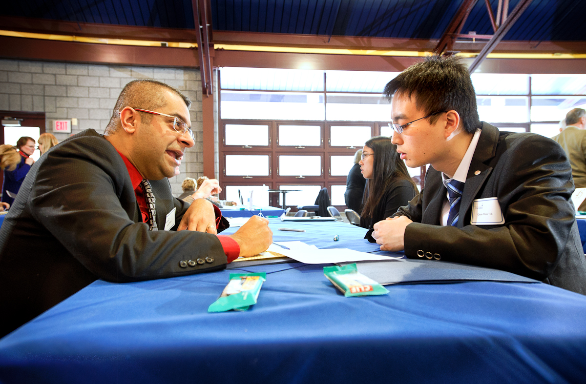 Director of Diversity and Inclusion Amit Taneja, left, interviews Quan Wan '14 during Interview Mojo.