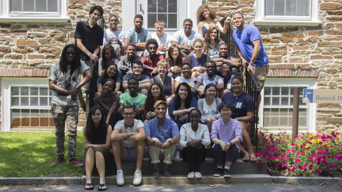 Opportunity Program students gather with President Joan Hinde Stewart on the steps of Buttrick.