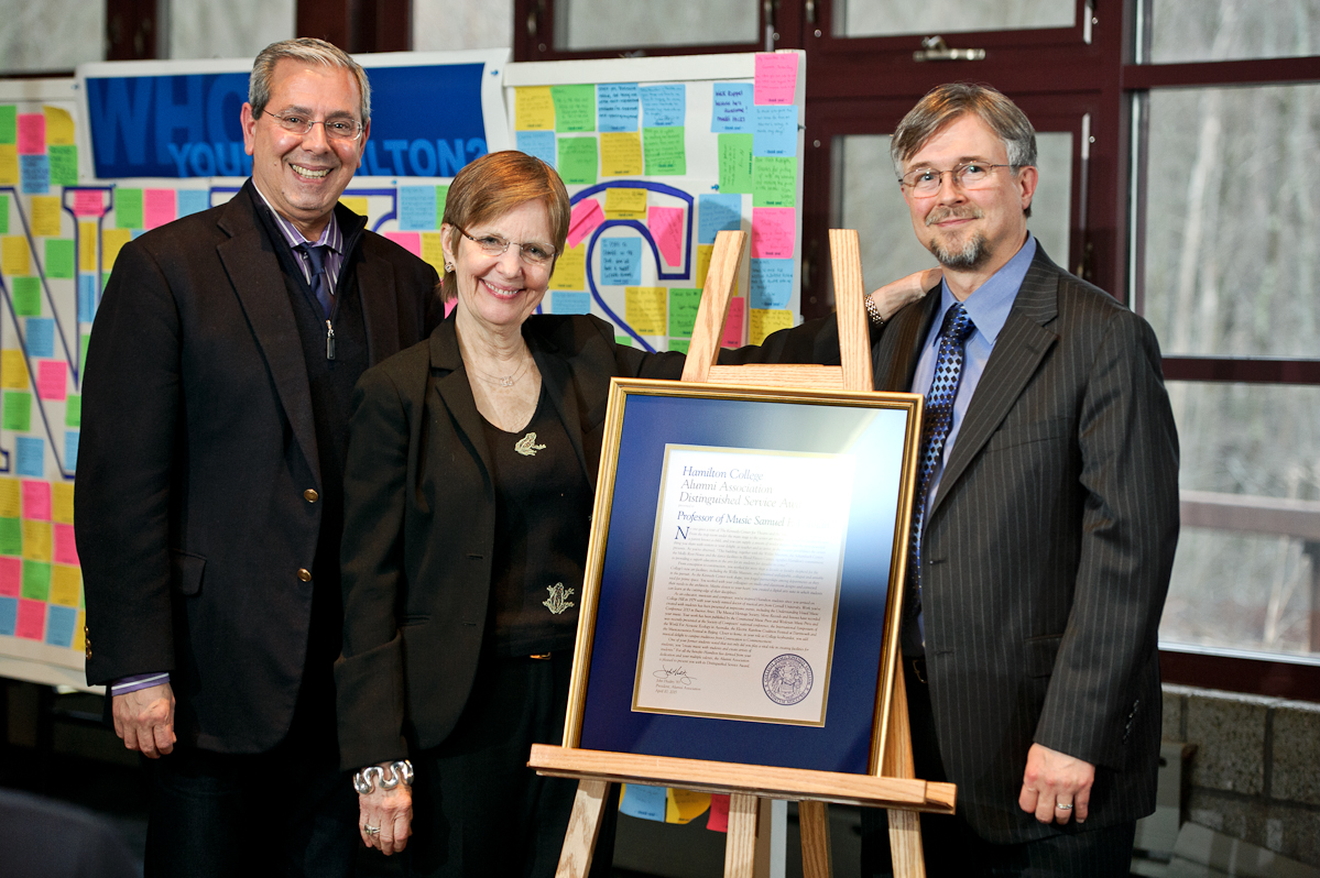 Alumni Association President John Hadity '83, President Joan Hinde Stewart and Sam Pellman, Distinguished Service Award recipient.