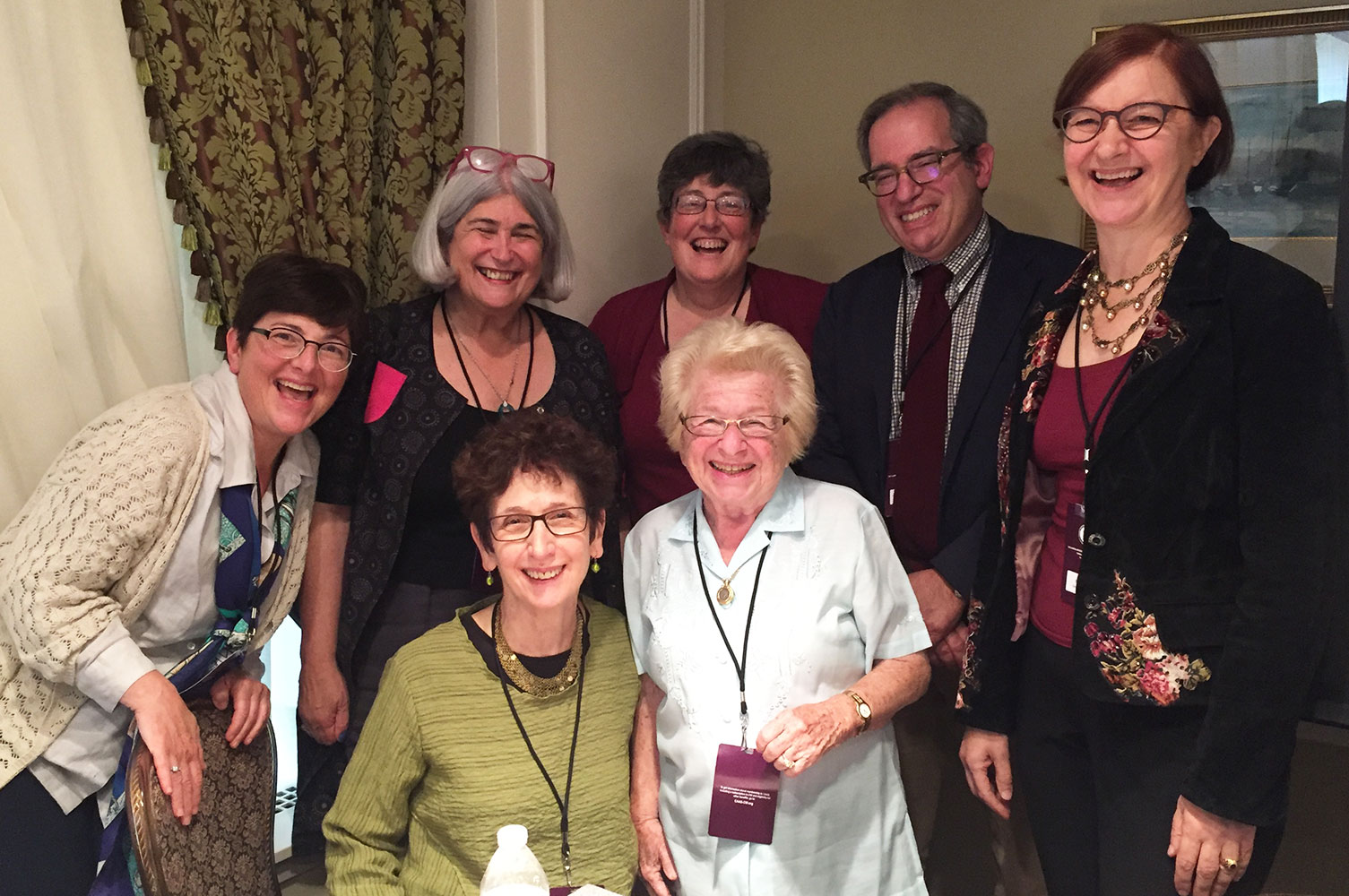 Professor Rabinowitz and Ruth Westheimer (Dr. Ruth), front, with CAAS panel members.