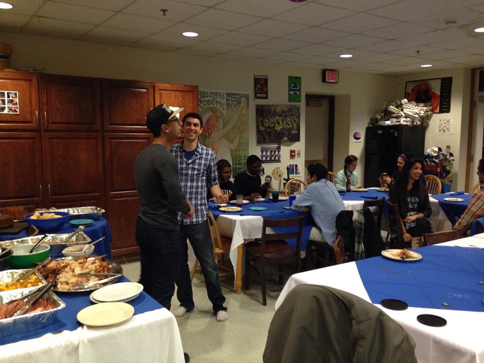 Students chat over Thanksgiving dinner in Woollcott House.