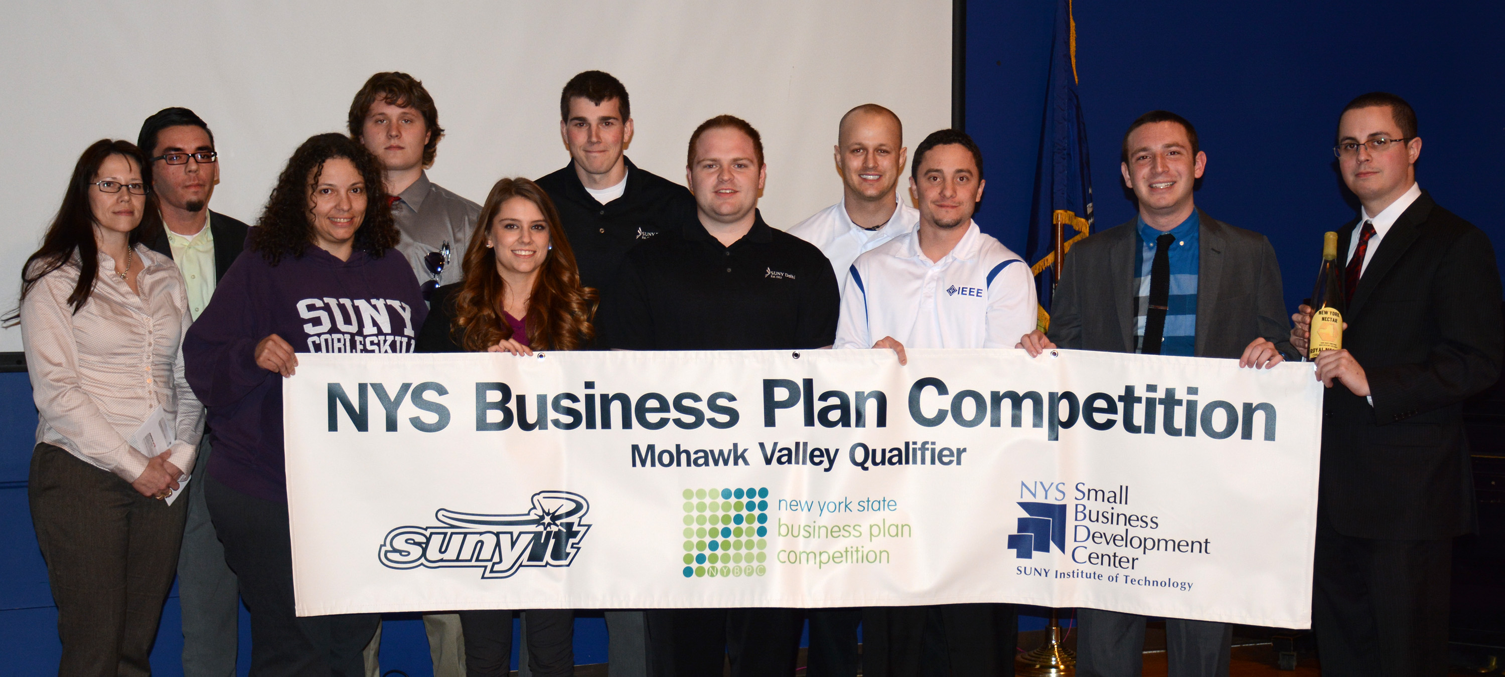 Sam Matlick '17, far right, with other contestants in the SUNY IT Business Plan Competition.