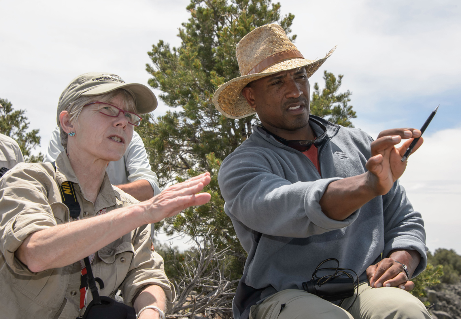 Professor Barbara Tewksbury and astronaut Victor Glover in the field in New Mexico.