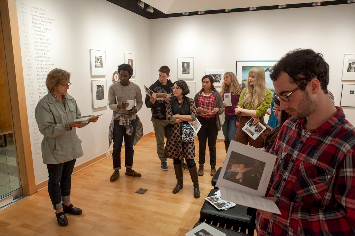 Students meet with Mary Lee Hodgens, associate director of Light Work in Syracuse.