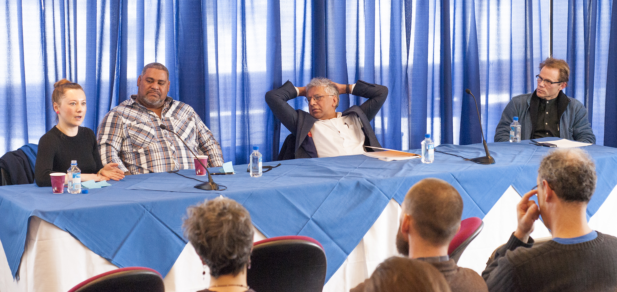 Panelists Valzhyna Mort, Chris Abani, Vijay Seshadri and moderator professor Doran Larson.