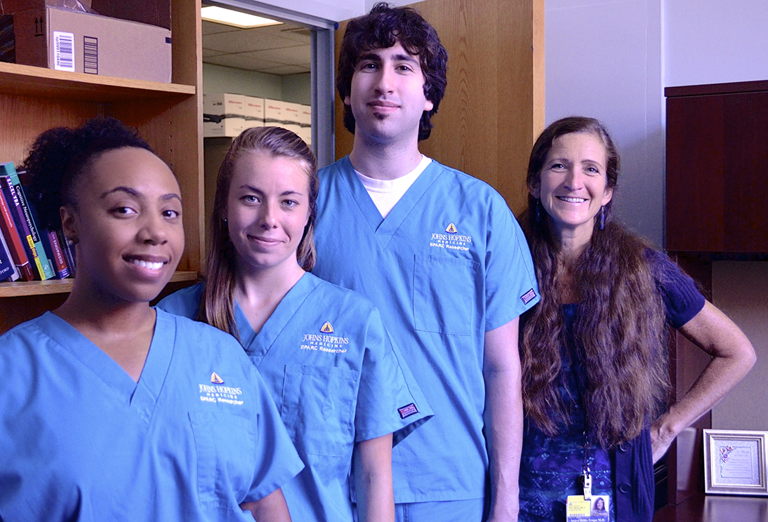 Cameron Davis, Amy Wright '15, Joseph Posner and Dr. Argye Hillis, stroke expert and head of the lab.